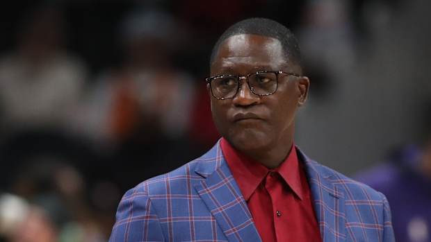 Dominique Wilkins looks on during a game.